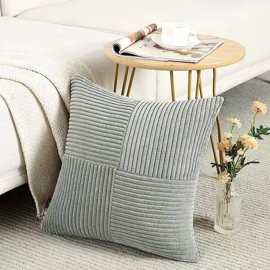 Light Grey ribbed corduroy cushion cover styled on a chair