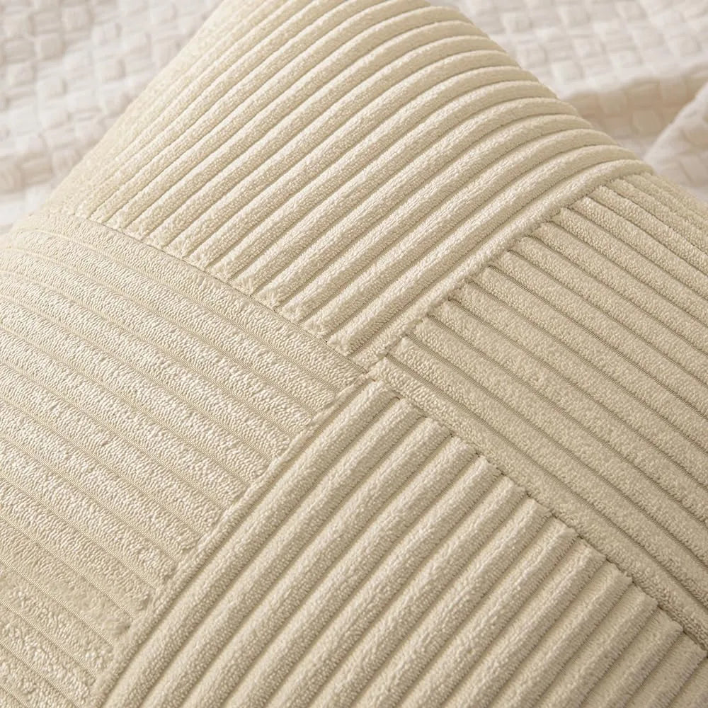 Close-up of the cushion cover's crossed ribbed corduroy panels