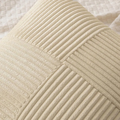 Close-up of the cushion cover's crossed ribbed corduroy panels